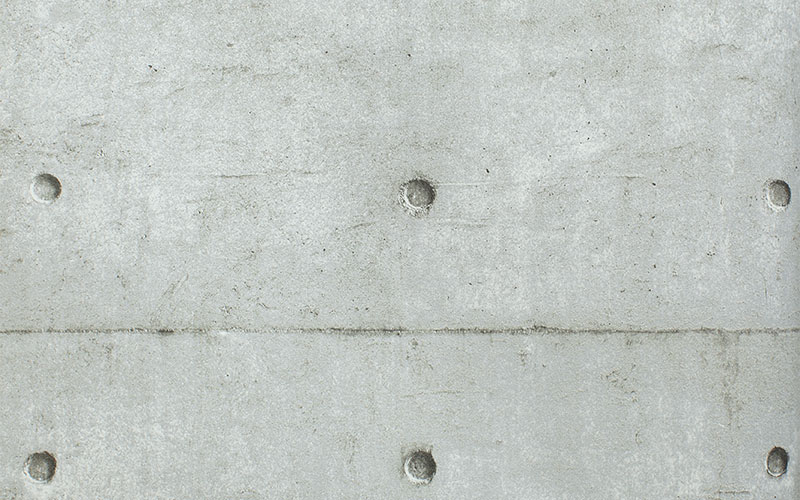 Серые флизелиновые обои Aura Grunge G45370 под бетонные панели